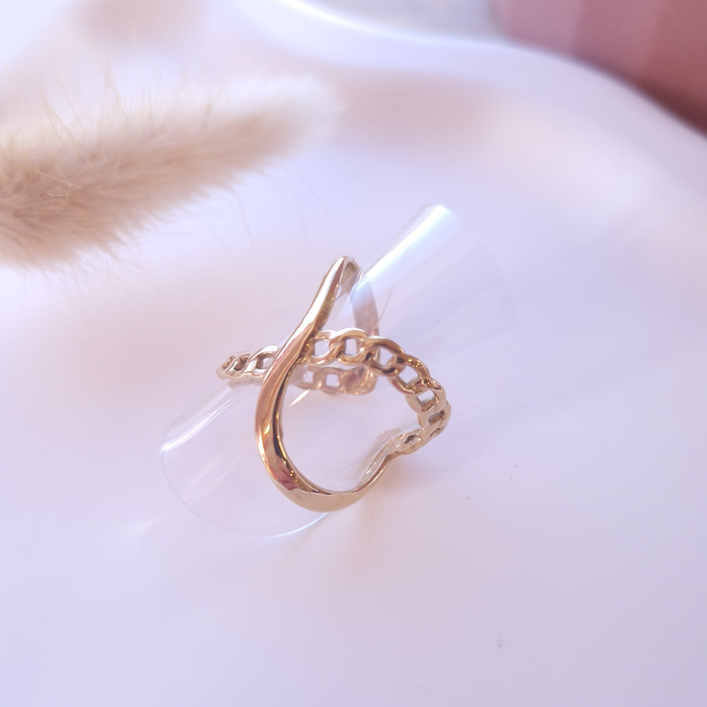 bague original forme X et effet maille chaine ajouré acier inoxydable doré