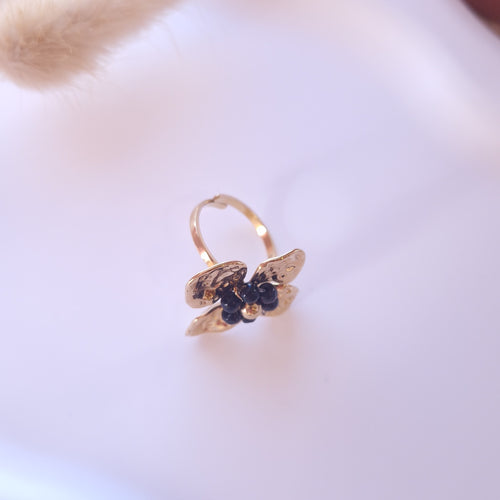bague acier inoxydable femme forme fleur perles noires