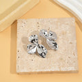 boucles d'oreilles tendance argenté pétales fleurs bijou acier inoxydable