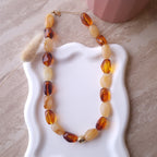 collier perle effet ambre femme et acier inoxydable